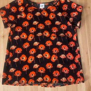 CAbi orange and black floral shirt